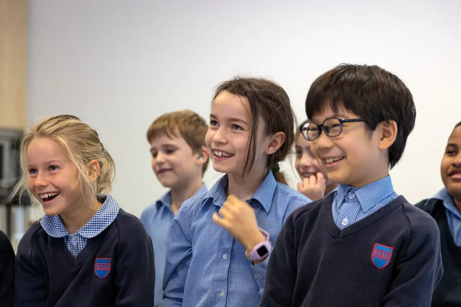 Pre-Prep pupils in a focused lesson at BJAB Brussels, developing phonics and early numeracy skills